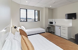 kitchenette with fridge and microwave